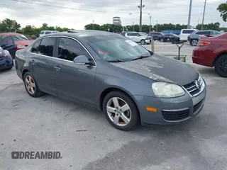 2009 Volkswagen Jetta SE z VIN 3VWRM71K99M167159, wystawiony jako IAAI lot #42409998 z przebiegiem 78 459 mil mil oraz . Historia ofert i sprzedaży dostępna na DreamBid. Obrazek 1.