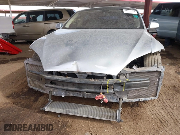 2014 Tesla Model S 60 with VIN 5YJSA1H17EFP35351, listed as a IAAI auction lot 41558434 with 151,002 mi miles and . Bid and sale history available at DreamBid. Image 6.
