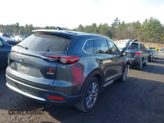 2017 Mazda CX-9 Grand Touring with VIN JM3TCBDY1H0141100, listed as a IAAI auction lot 41054513 with 65,607 mi miles. Bid and sale history available at carsss.com. Image 4.