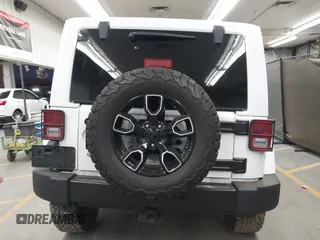 2017 Jeep Wrangler Unlimited Sahara with VIN 1C4BJWEG2HL700840, listed as a IAAI auction lot 42631036 with 60,610 mi miles and . Bid and sale history available at DreamBid. Image 16.