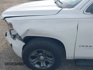 2017 Chevrolet Tahoe LT with VIN 1GNSKBKCXHR350028, listed as a IAAI auction lot 41684954 with 117,261 mi miles and . Bid and sale history available at DreamBid. Image 18.
