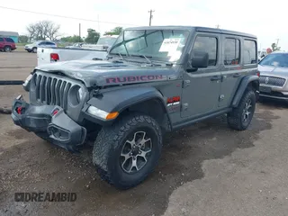 2020 Jeep Wrangler Unlimited Rubicon z VIN 1C4HJXFG7LW193665, wystawiony jako IAAI lot #41874930 z przebiegiem 58 884 mil mil oraz . Historia ofert i sprzedaży dostępna na DreamBid. Obrazek 17.