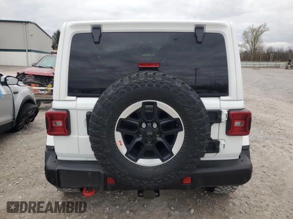 2021 Jeep Wrangler Rubicon with VIN 1C4HJXCG8MW857560, listed as a Copart auction lot 76726934 with 43,366 mi miles and Salvage title. Bid and sale history available at DreamBid. Image 6.