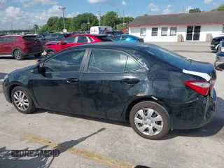 2016 Toyota Corolla L z VIN 2T1BURHE8GC542075, wystawiony jako IAAI lot #41904525 z przebiegiem 125 337 mil mil oraz . Historia ofert i sprzedaży dostępna na DreamBid. Obrazek 14.