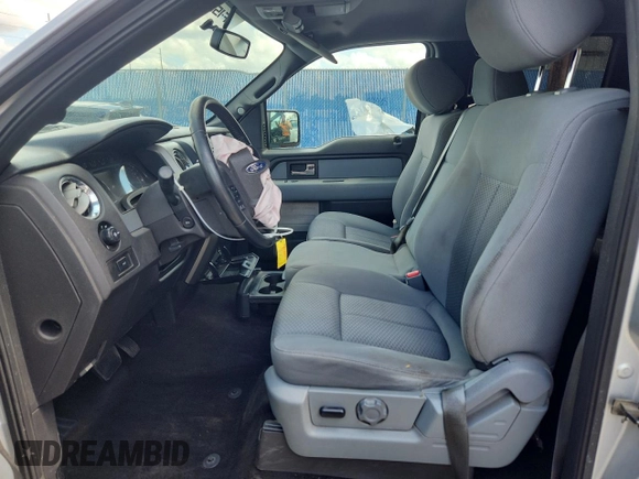 2013 Ford F-150 XL with VIN 1FTFW1CFXDFA77959, listed as a Copart auction lot 62317545 with 132,472 mi miles and Salvage title. Bid and sale history available at DreamBid. Image 7.