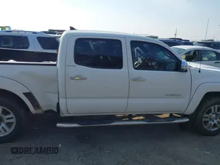 2015 Toyota Tacoma with VIN 3TMMU4FN5FM073323, listed as a IAAI auction lot 41800476 with 132,250 mi miles and . Bid and sale history available at DreamBid. Image 12.