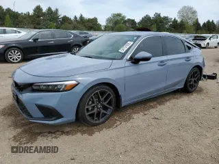 2022 Honda Civic Sport Touring z VIN 19XFL1H81NE023075, wystawiony jako Copart lot #54757855 z przebiegiem 63 311 mil mil oraz Szkoda całkowita • Salvage title. Historia ofert i sprzedaży dostępna na DreamBid. Obrazek 1.