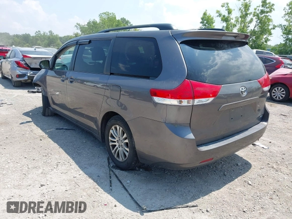2012 Toyota Sienna XLE AAS with VIN 5TDYK3DCXCS202574, listed as a IAAI auction lot 42714762 with 234,287 mi miles and . Bid and sale history available at DreamBid. Image 3.
