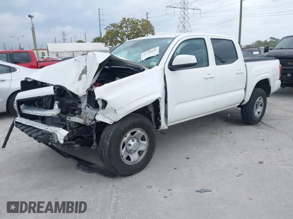 2022 Toyota Tacoma SR with VIN 3TMCZ5AN7NM470444, listed as a IAAI auction lot 41729041 with 34,248 mi miles and . Bid and sale history available at DreamBid. Image 2.