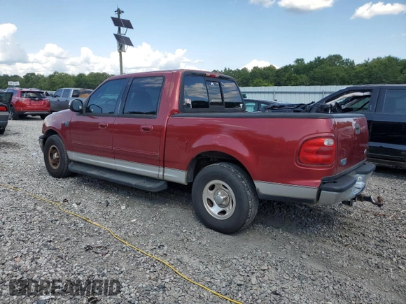 2001 Ford F-150 XLT with VIN 1FTRW07LX1KD65474, listed as a Copart auction lot 61474655 with 361,023 mi miles and Salvage title. Bid and sale history available at DreamBid. Image 2.