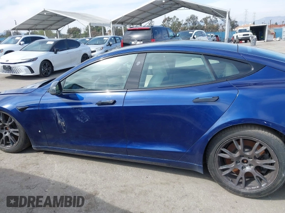2021 Tesla Model S Long Range with VIN 5YJSA1E51MF442874, listed as a IAAI auction lot 39406495 with 36,127 mi miles and . Bid and sale history available at DreamBid. Image 15.