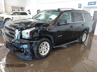2020 GMC Yukon SLT with VIN 1GKS2BKC6LR232354, listed as a IAAI auction lot 41313325 with 107,960 mi miles. Bid and sale history available at carsss.com. Image 2.
