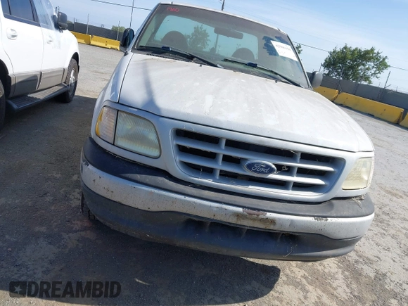1999 Ford F-150 with VIN 1FTZF172XXNB31548, listed as a IAAI auction lot 42566104 with Not provided miles and . Bid and sale history available at DreamBid. Image 6.