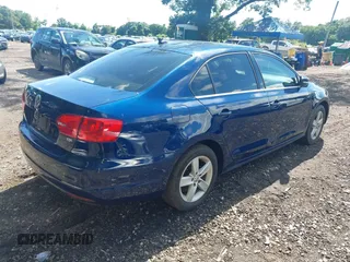 2014 Volkswagen Jetta TDI w/Premium/Nav with VIN 3VWLL7AJ3EM232789, listed as a IAAI auction lot 42737539 with 60,263 mi miles and . Bid and sale history available at DreamBid. Image 4.