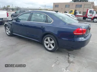 2012 Volkswagen Passat SE z VIN 1VWBP7A39CC056590, wystawiony jako IAAI lot #41879975 z przebiegiem 76 125 mil mil oraz . Historia ofert i sprzedaży dostępna na DreamBid. Obrazek 3.