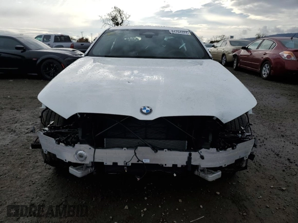 2024 BMW 5 Series 530i with VIN WBA43FJ0XRCS14707, listed as a Copart auction lot 84764324 with 7,409 mi miles and Salvage Title. Bid and sale history available at carsss.com. Image 5.