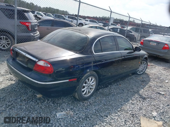 2005 Jaguar S-Type with VIN SAJWA01T15FN16454, listed as a IAAI auction lot 41650066 with 104,942 mi miles and . Bid and sale history available at DreamBid. Image 4.