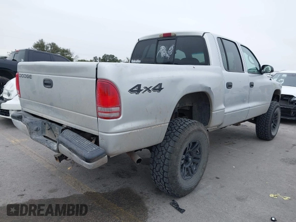 2004 Dodge Dakota Sport with VIN 1D7HG38NX4S608298, listed as a IAAI auction lot 41621473 with 192,876 mi miles. Bid and sale history available at carsss.com. Image 4.