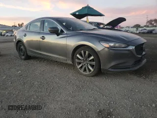 2021 Mazda 6 Touring with VIN JM1GL1VM4M1601208, listed as a Copart auction lot 82356024 with 415,666 mi miles and Clean Title. Bid and sale history available at carsss.com. Image 4.