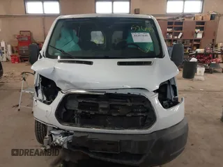 2016 Ford Transit Cargo z VIN 1FTYE1YM1GKB30742, wystawiony jako IAAI lot #41357645 z przebiegiem 240 747 mil mil oraz . Historia ofert i sprzedaży dostępna na DreamBid. Obrazek 13.