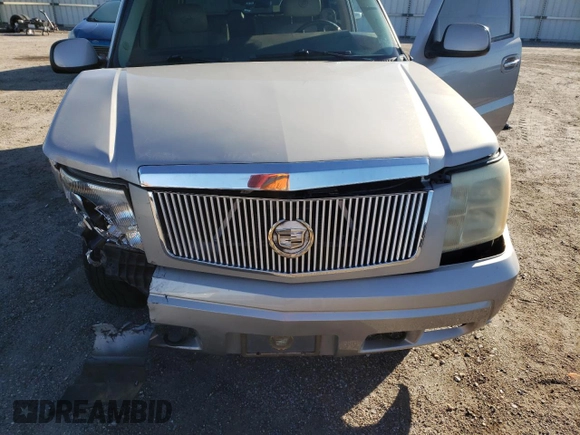 2004 Cadillac Escalade z VIN 1GYEC63T04R107597, wystawiony jako Copart lot #87259974 z przebiegiem Nie podano mil oraz Nie do naprawy • Non repairable. Historia ofert i sprzedaży dostępna na DreamBid. Obrazek 12.
