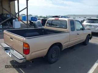 1999 Toyota Tacoma with VIN 4TAVL52N4XZ478703, listed as a IAAI auction lot 42504706 with 34,389 mi miles and . Bid and sale history available at DreamBid. Image 4.