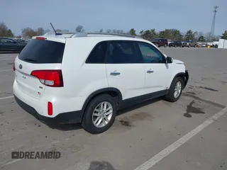 2014 Kia Sorento LX with VIN 5XYKTCA63EG545549, listed as a IAAI auction lot 41841324 with 173,813 mi miles and . Bid and sale history available at carsss.com. Image 4.