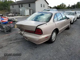 1998 Oldsmobile 88 LS z VIN 1G3HN52K0W4857890, wystawiony jako Copart lot #56019374 z przebiegiem 170 105 mil mil oraz Szkody całkowita. Historia ofert i sprzedaży dostępna na DreamBid. Obrazek 4.