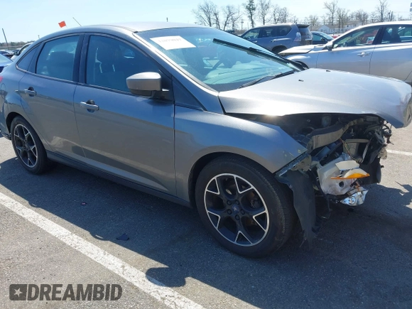 2012 Ford Focus SE with VIN 1FAHP3F25CL335319, listed as a IAAI auction lot 42079047 with 173,443 mi miles. Bid and sale history available at carsss.com. Image 1.