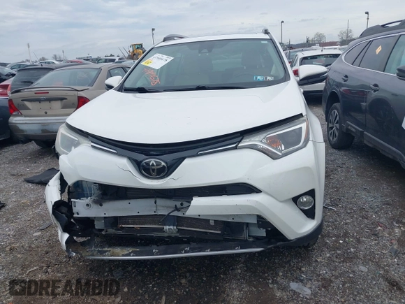 2018 Toyota RAV4 XLE with VIN JTMRFREV8JJ225065, listed as a IAAI auction lot 41940678 with 145,074 mi miles. Bid and sale history available at carsss.com. Image 12.
