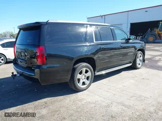2017 Chevrolet Suburban Premier with VIN 1GNSKJKC0HR114398, listed as a IAAI auction lot 41745611 with 211,906 mi miles. Bid and sale history available at carsss.com. Image 4.
