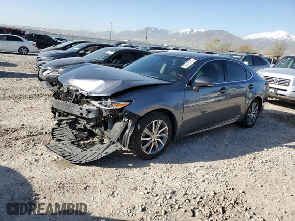 2017 Lexus ES 300h with VIN JTHBW1GG6H2153822, listed as a Copart auction lot 52315815 with 73,727 mi miles and Salvage Title. Bid and sale history available at DreamBid. Image 1.
