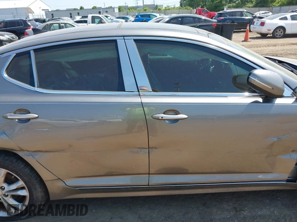 2013 Kia Optima SX z VIN 5XXGR4A65DG120332, wystawiony jako IAAI lot #42323216 z przebiegiem Nie podano mil oraz . Historia ofert i sprzedaży dostępna na DreamBid. Obrazek 13.