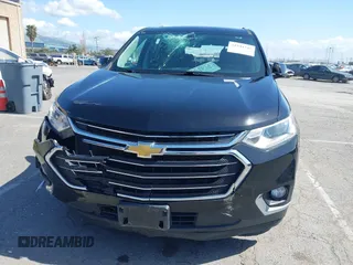 2021 Chevrolet Traverse LT Cloth with VIN 1GNERGKW9MJ162089, listed as a IAAI auction lot 41944248 with 99,586 mi miles. Bid and sale history available at carsss.com. Image 6.
