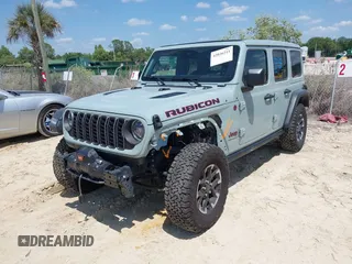2024 Jeep Wrangler Rubicon with VIN 1C4PJXFG3RW295565, listed as a IAAI auction lot 42026211 with 5,661 mi miles. Bid and sale history available at carsss.com. Image 6.
