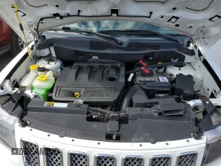 2014 Jeep Compass Latitude with VIN 1C4NJDEB3ED884861, listed as a Copart auction lot 53627265 with 148,619 mi miles and Clean Title. Bid and sale history available at carsss.com. Image 12.