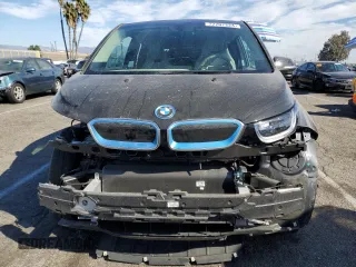 2019 BMW i3 with VIN WBY8P4C51K7E84270, listed as a Copart auction lot 77707224 with 15,584 mi miles and Salvage Title. Bid and sale history available at carsss.com. Image 5.
