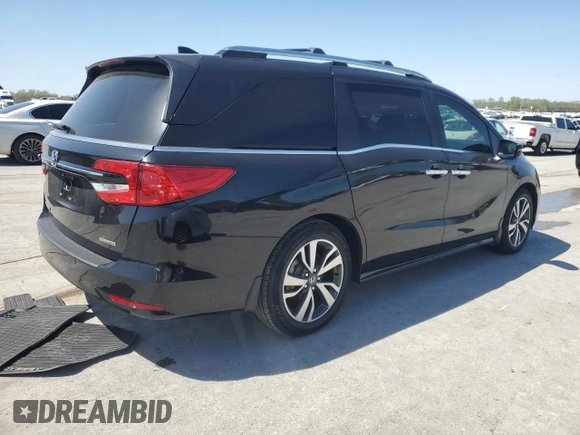 2021 Honda Odyssey Touring with VIN 5FNRL6H80MB036564, listed as a Copart auction lot 52218215 with 44,556 mi miles and Salvage Title. Bid and sale history available at carsss.com. Image 3.