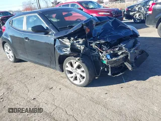 2016 Hyundai Veloster z VIN KMHTC6AD6GU299405, wystawiony jako IAAI lot #40846986 z przebiegiem 48 262 mil mil oraz . Historia ofert i sprzedaży dostępna na DreamBid. Obrazek 1.