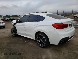 2018 BMW X6 xDrive50i with VIN 5UXKU6C51J0W38863, listed as a Copart auction lot 73083632 with 59,290 mi miles. Bid and sale history available at carsss.com. Image 2.