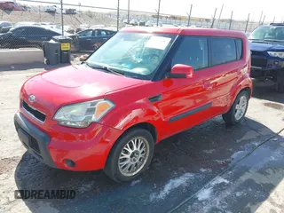 2010 Kia Soul + with VIN KNDJT2A28A7104493, listed as a IAAI auction lot 42023796 with 124,582 mi miles. Bid and sale history available at carsss.com. Image 2.