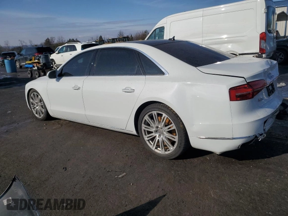 2016 Audi A8 3.0T with VIN WAU34AFD7GN008642, listed as a Copart auction lot 88980125 with 78,861 mi miles and Salvage title. Bid and sale history available at DreamBid. Image 2.