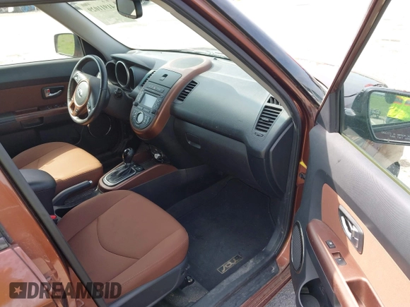 2012 Kia Soul + with VIN KNDJT2A63C7422074, listed as a IAAI auction lot 41911029 with 112,125 mi miles. Bid and sale history available at carsss.com. Image 5.