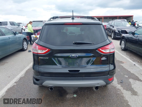 2013 Ford Escape SE z VIN 1FMCU9GX0DUB85914, wystawiony jako IAAI lot #42161300 z przebiegiem 185 255 mil mil oraz . Historia ofert i sprzedaży dostępna na DreamBid. Obrazek 16.