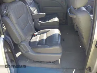 2008 Honda Odyssey EX-L with VIN 5FNRL38628B410157, listed as a IAAI auction lot 42072217 with 240,099 mi miles and . Bid and sale history available at DreamBid. Image 8.