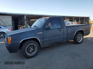 1994 Mitsubishi Mighty Max z VIN JA7LS21G6RP012556, wystawiony jako Copart lot #44242825 z przebiegiem 213 338 mil mil oraz Szkody całkowita. Historia ofert i sprzedaży dostępna na DreamBid. Obrazek 1.