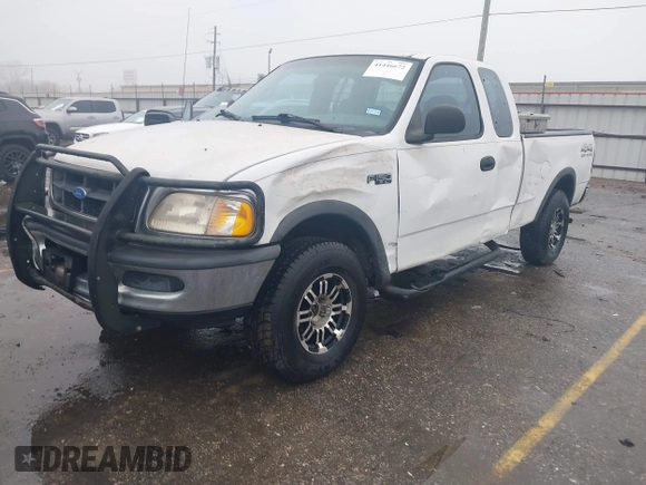 1997 Ford F-150 XL with VIN 1FTDX1863VNB01474, listed as a IAAI auction lot 41446672 with 223,296 mi miles. Bid and sale history available at carsss.com. Image 2.