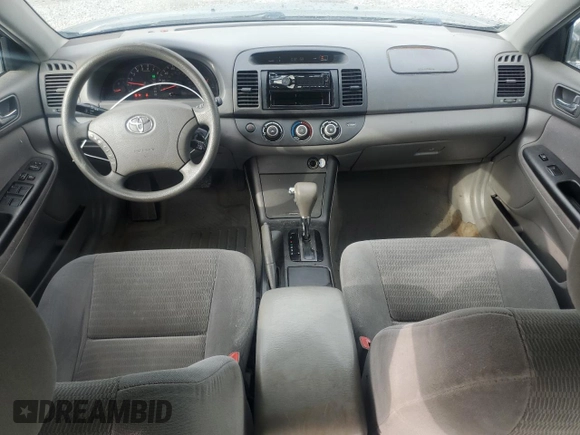 2005 Toyota Camry LE with VIN 4T1BF32K45U599214, listed as a Copart auction lot 52609295 with 304,316 mi miles and Salvage Title. Bid and sale history available at DreamBid. Image 8.
