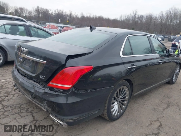 2018 Genesis G90 3.3T Premium with VIN KMHG34JA7JU041008, listed as a IAAI auction lot 41719369 with 146,874 mi miles. Bid and sale history available at carsss.com. Image 4.