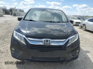 2018 Honda Odyssey EX-L with VIN 5FNRL6H77JB009851, listed as a Copart auction lot 52203155 with 127,575 mi miles and Salvage Title. Bid and sale history available at carsss.com. Image 5.